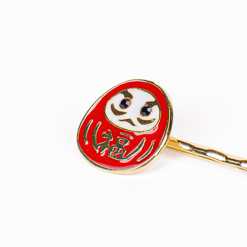 Japanilaiset Daruma- ja Sakura-hiusklipsit
