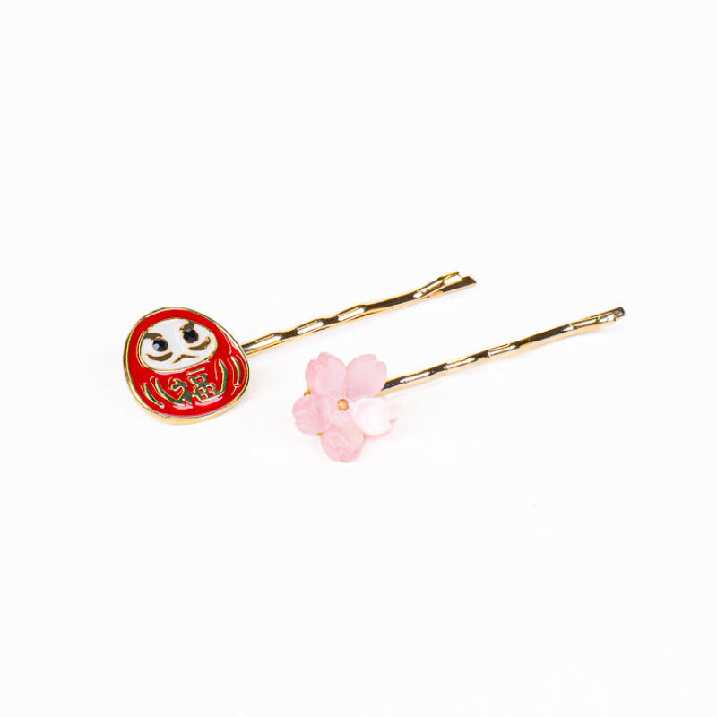 Japanilaiset Daruma- ja Sakura-hiusklipsit