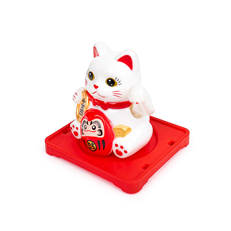 Liikkuva aurinkoenergialla toimiva Maneki Neko -kissa – Daruma