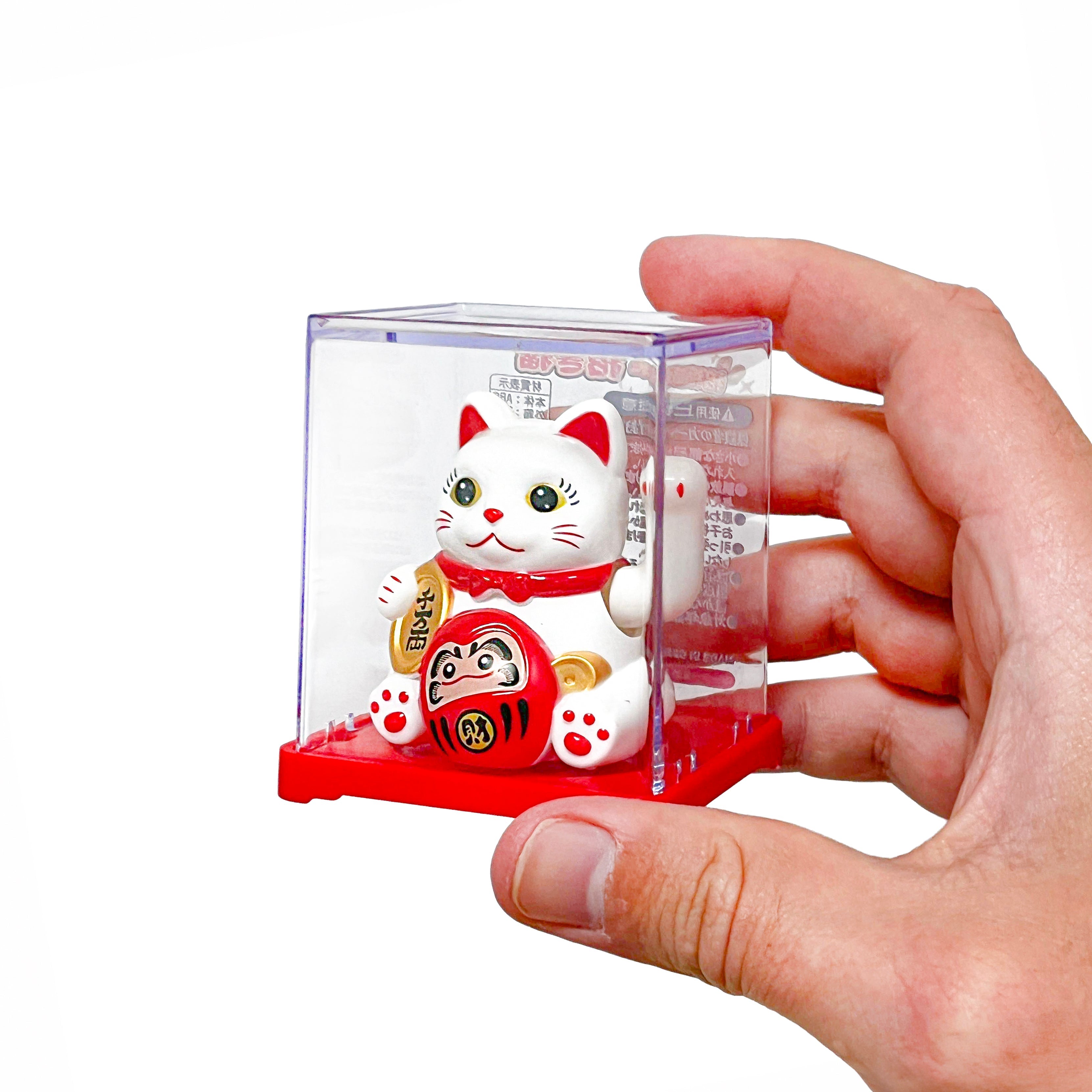 Liikkuva aurinkoenergialla toimiva Maneki Neko -kissa – Daruma