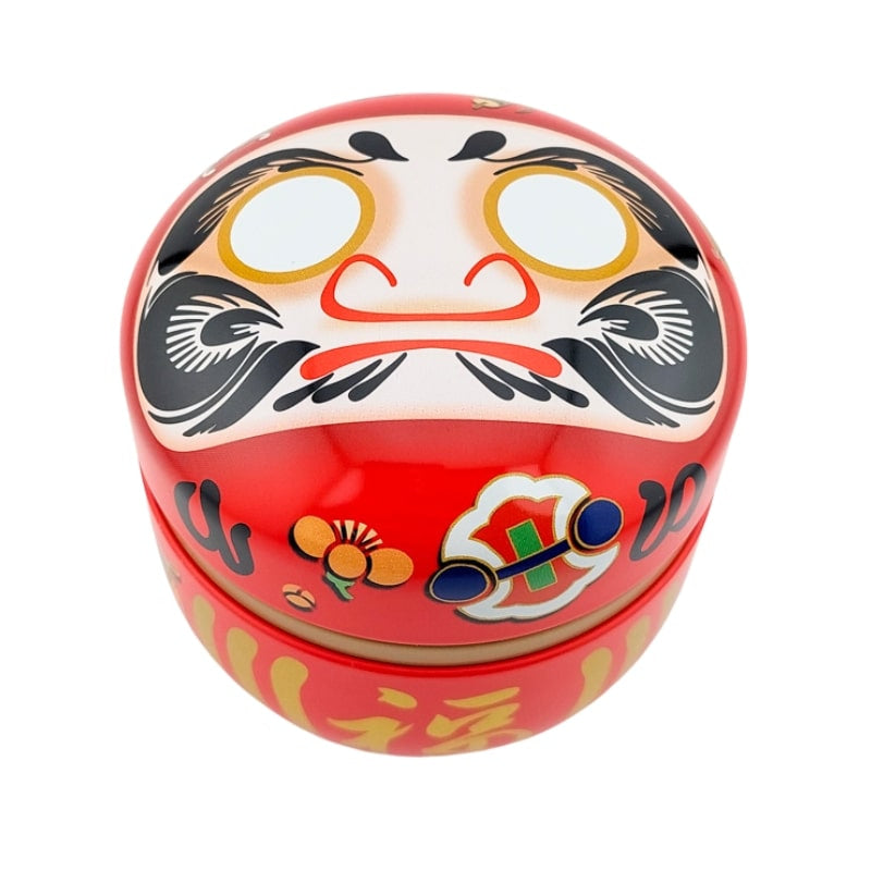 Daruma punainen metallinen teepakkaus