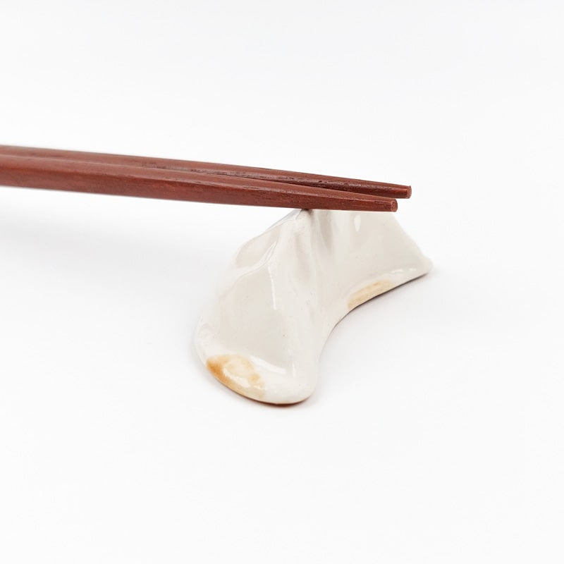 Japanilainen Gyoza syömäpuikko lepää