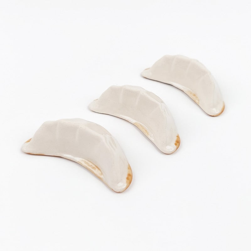 Japanilainen Gyoza syömäpuikko lepää