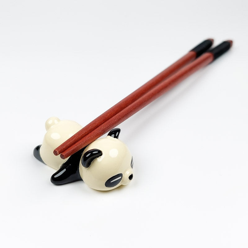 Japanilainen Panda syömäpuikko lepää