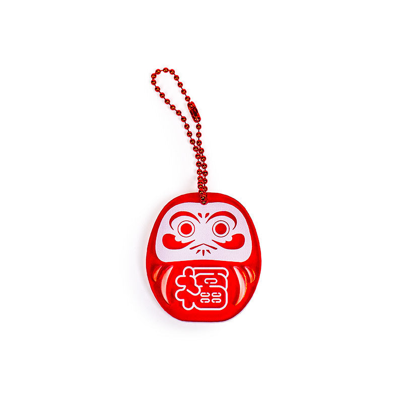 Fluoresoiva punainen Daruma-avaimenperä