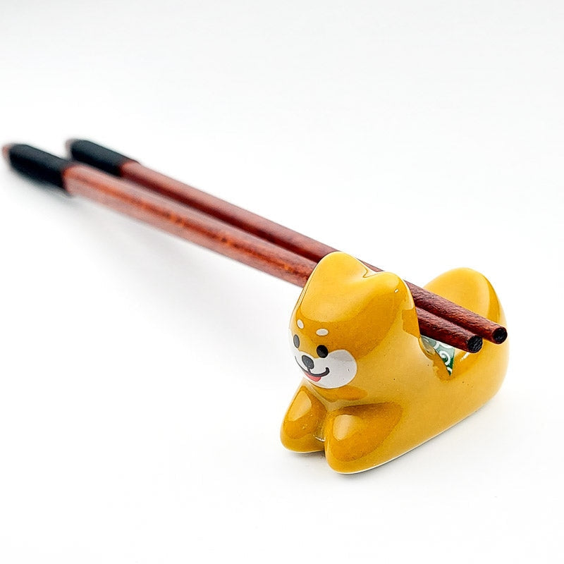 Shiba Inu syömäpuikko lepo
