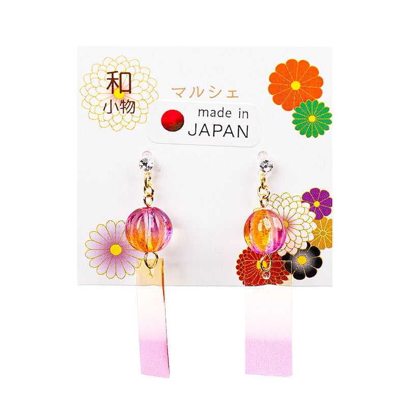 Vaaleanpunaiset japanilaiset kellonsoiton korvakorut