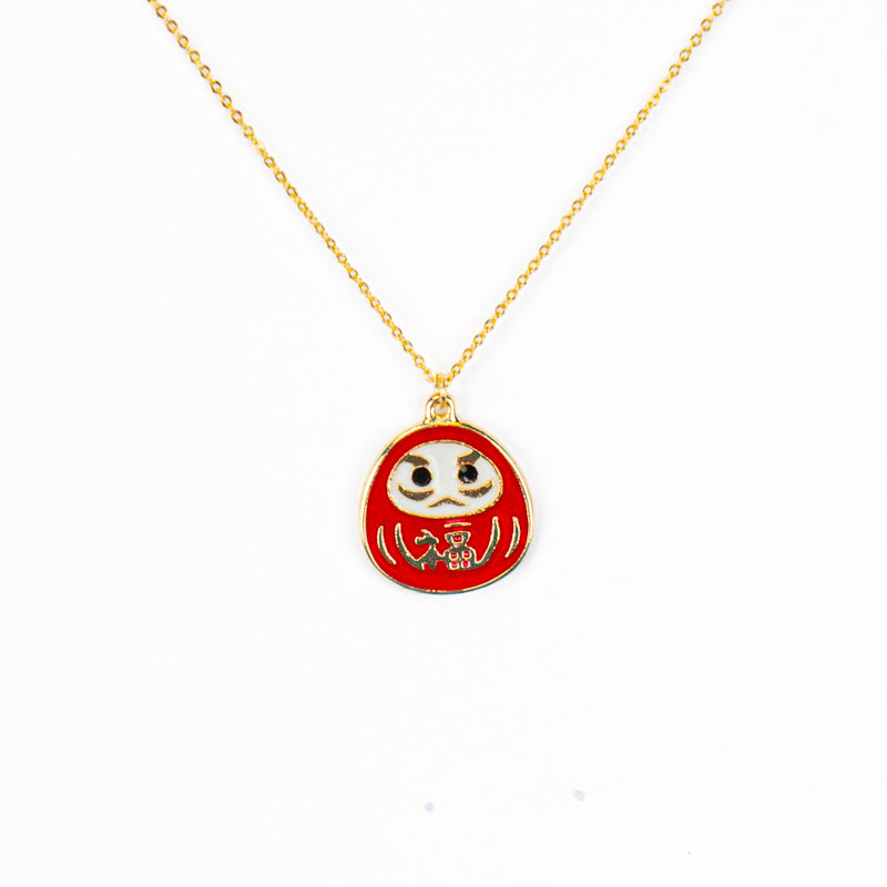 Japanilainen kaulakoru, punainen ja kultainen Daruma-riipus