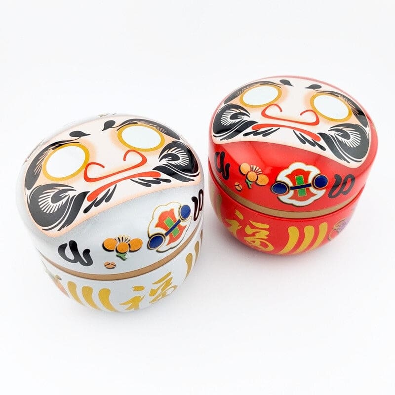 Daruma punainen metallinen teepakkaus