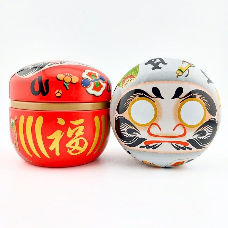 Daruma punainen metallinen teepakkaus