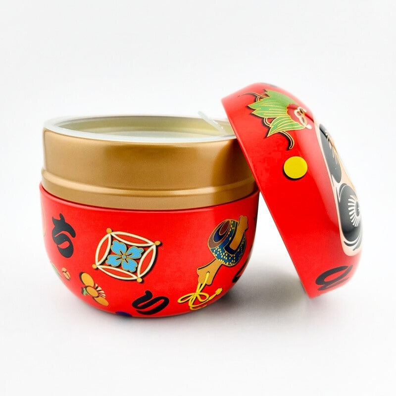 Daruma punainen metallinen teepakkaus