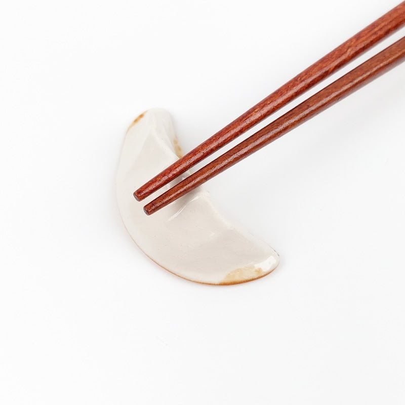 Japanilainen Gyoza syömäpuikko lepää