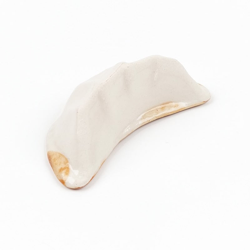 Japanilainen Gyoza syömäpuikko lepää