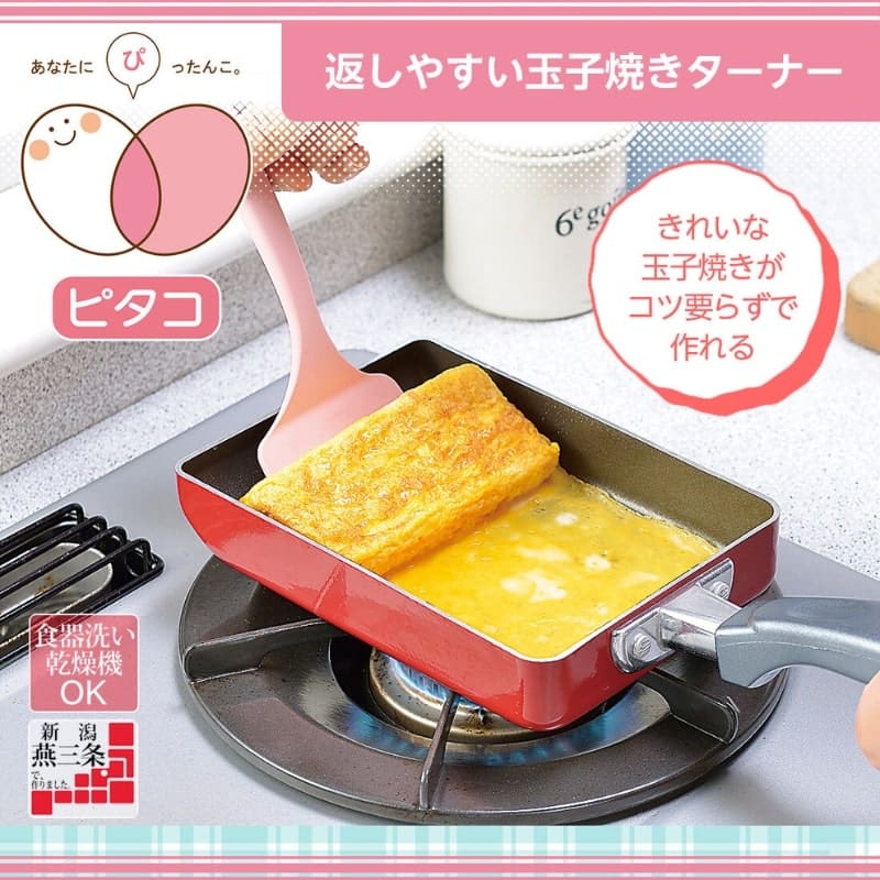 Japanilainen lastalla Tamagoyaki munakas