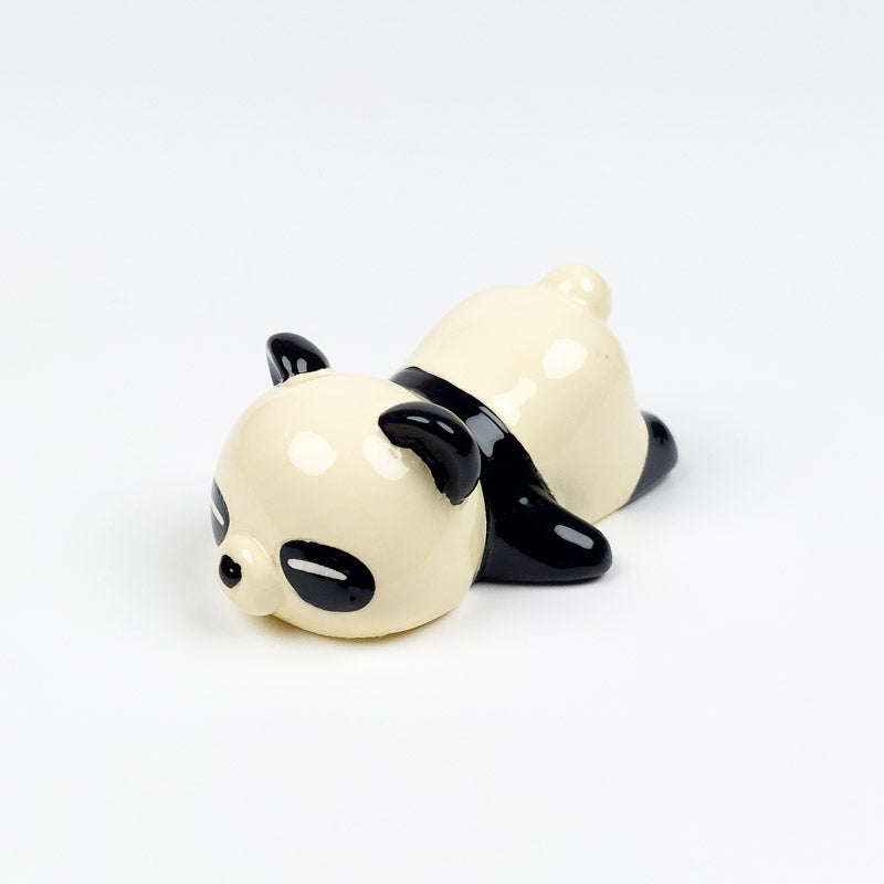 Japanilainen Panda syömäpuikko lepää