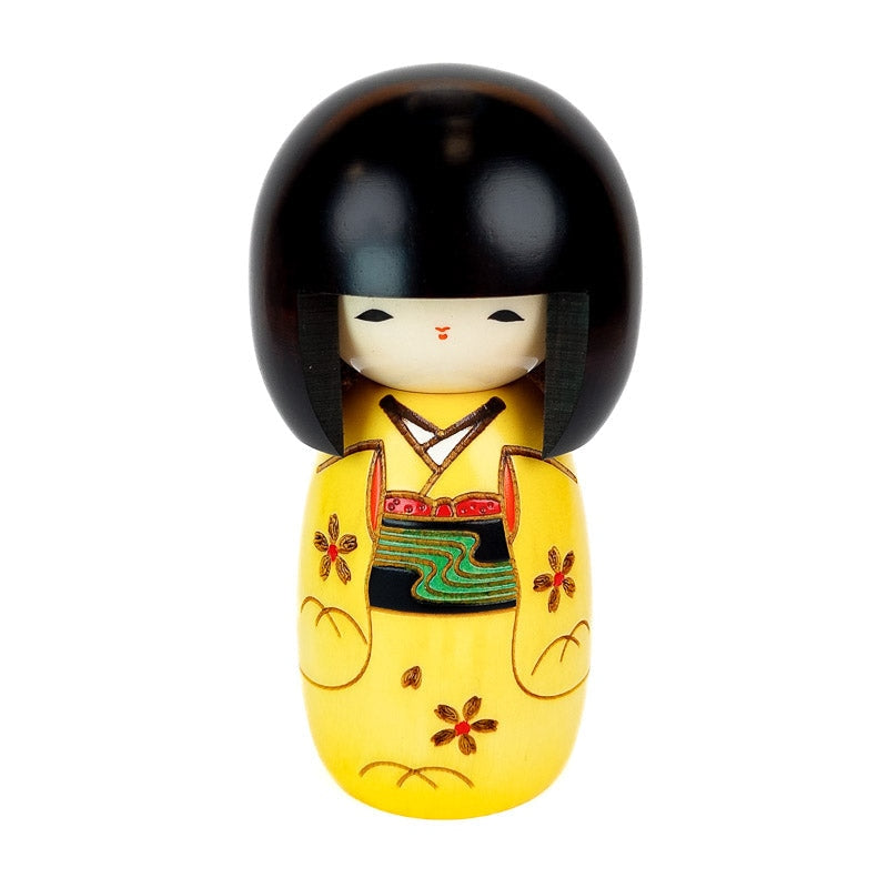 Keltainen Kokeshi-nukke