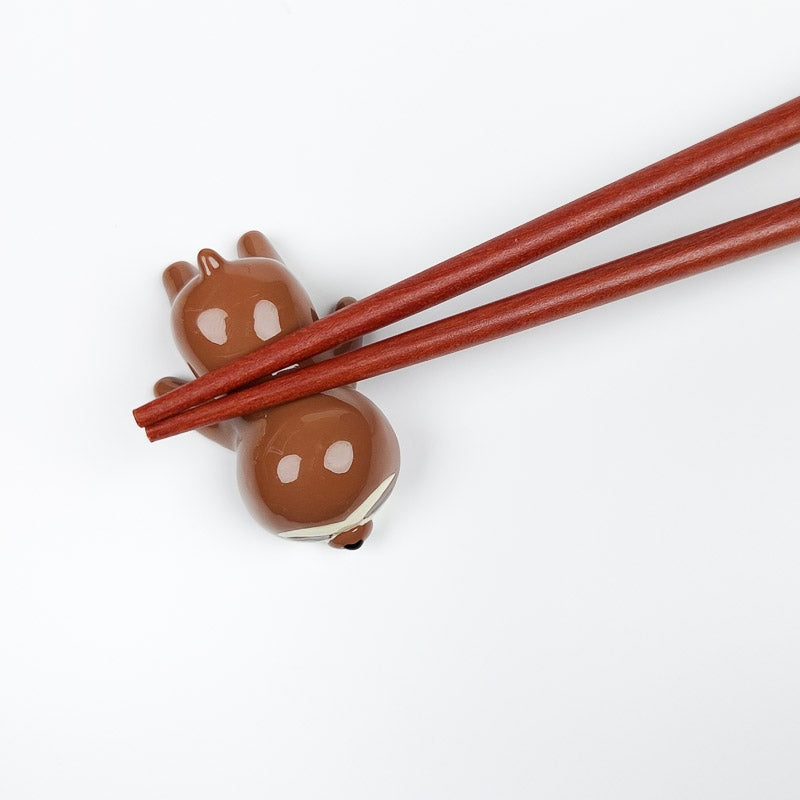 Laiska japanilainen syömäpuikko lepää