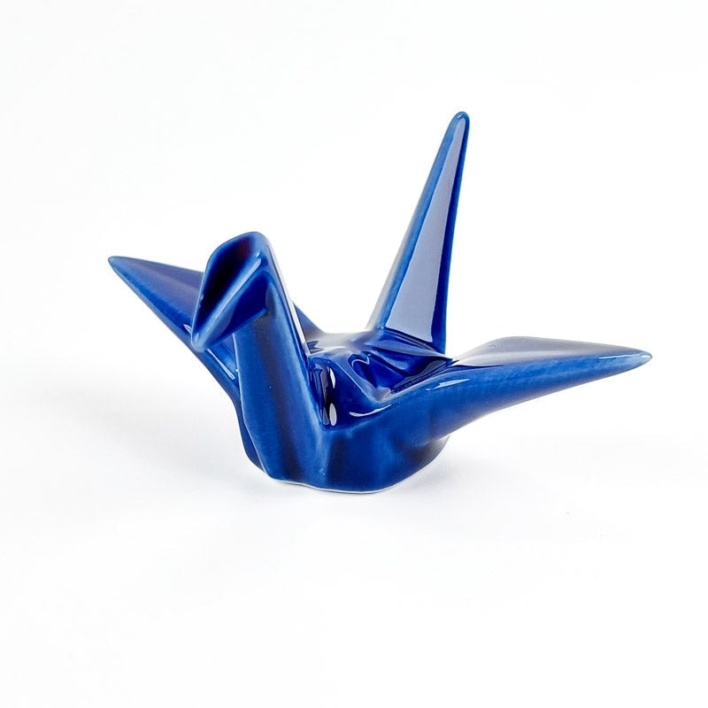 Origami Sininen syömäpuikko lepää