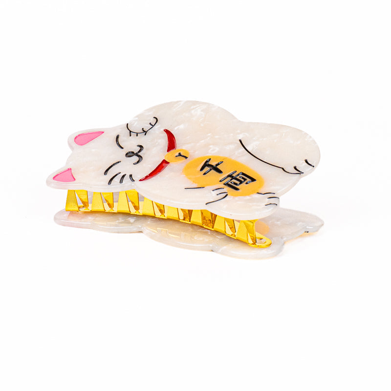Japanilainen Maneki-Neko-hiussalpa
