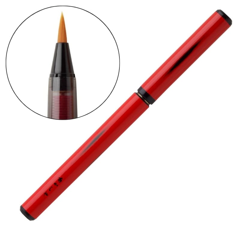 Punainen lakattu bambuharja ja puulaatikko